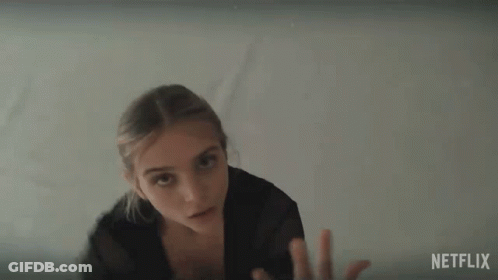 Netflix Ad Woman In Black Top GIF