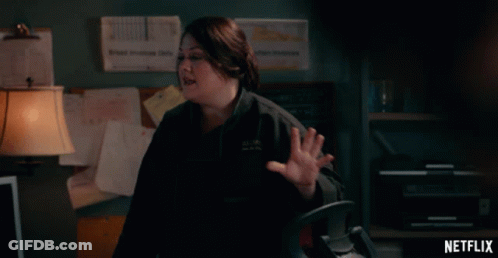 Netflix Ad Woman In Dark Office GIF