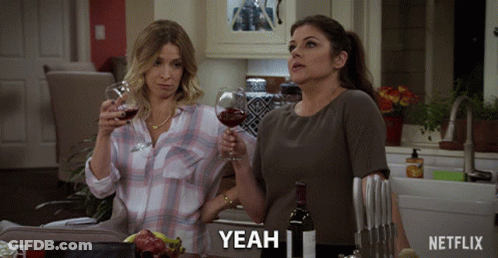 Netflix Ad Women Toasting With Wine GIF