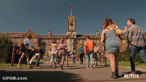 Netflix Brick Building People Walking GIF