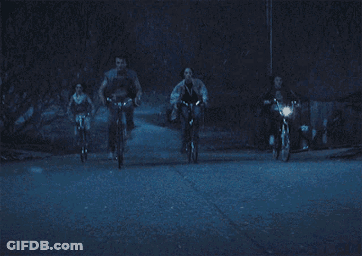 Netflix Series Stranger Things Characters Riding Bike GIF