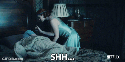 Netflix Woman Covering Person's Head With Blanket GIF
