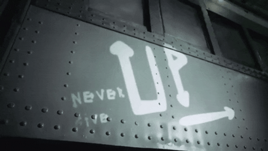 Never Give Up Sign GIF