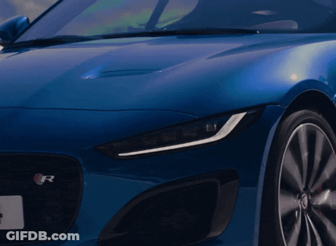 New Luxury Car Blue Jaguar Test Driving Fast GIF