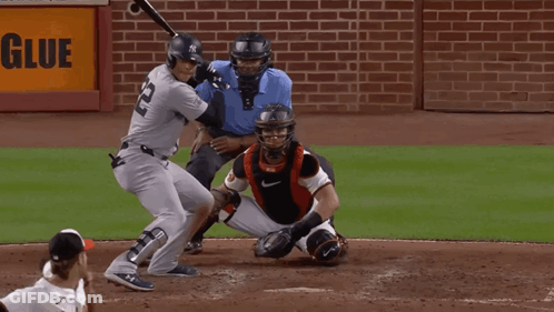 New York Baseball Player Swinging At Pitch GIF