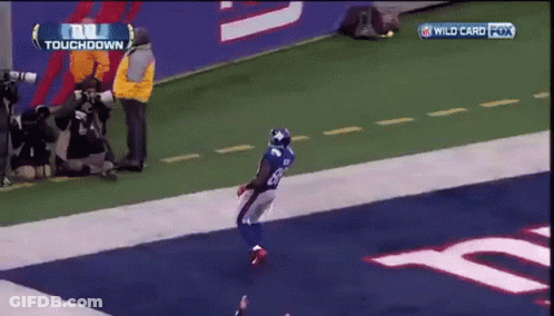 New York Giants Football Player Running Towards End Zone GIF