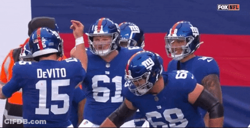 New York Giants Football Players Including Devito GIF