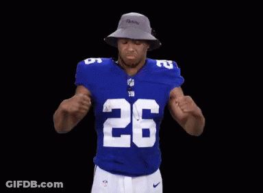New York Giants Player Flexing Muscles GIF