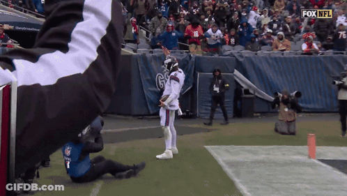 New York Giants Player Flexing Muscles GIF