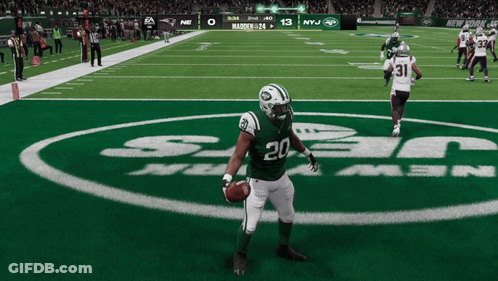 New York Jets Player Holding Football GIF