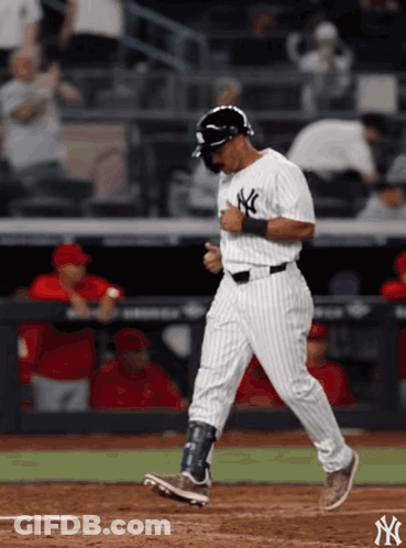 New York Yankees Baseball Player Running Towards Home Plate GIF