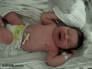 Newborn Baby Crying On Bed GIF