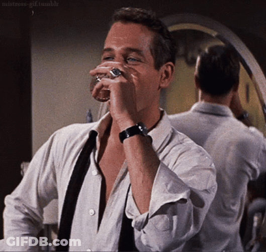 Newman Smirking And Drinking GIF