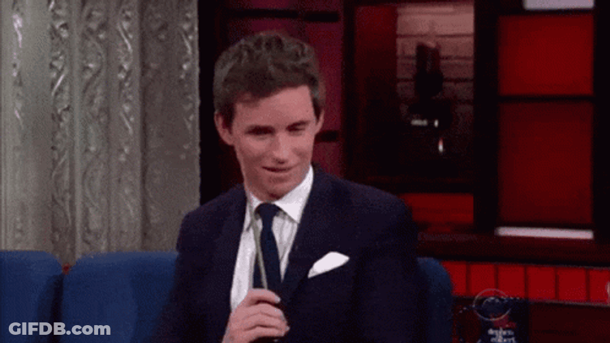 Newt Scamander Scratching Head With Wand GIF