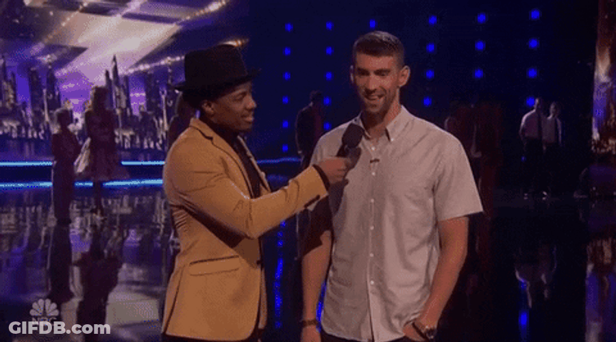 Nick Cannon Interviewing Michael Phelps GIF