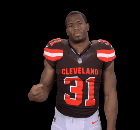 Nick Chubb Showing Off Arm Muscle GIF