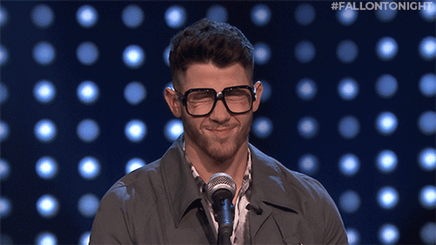 Nick Jonas Drenched With Water GIF