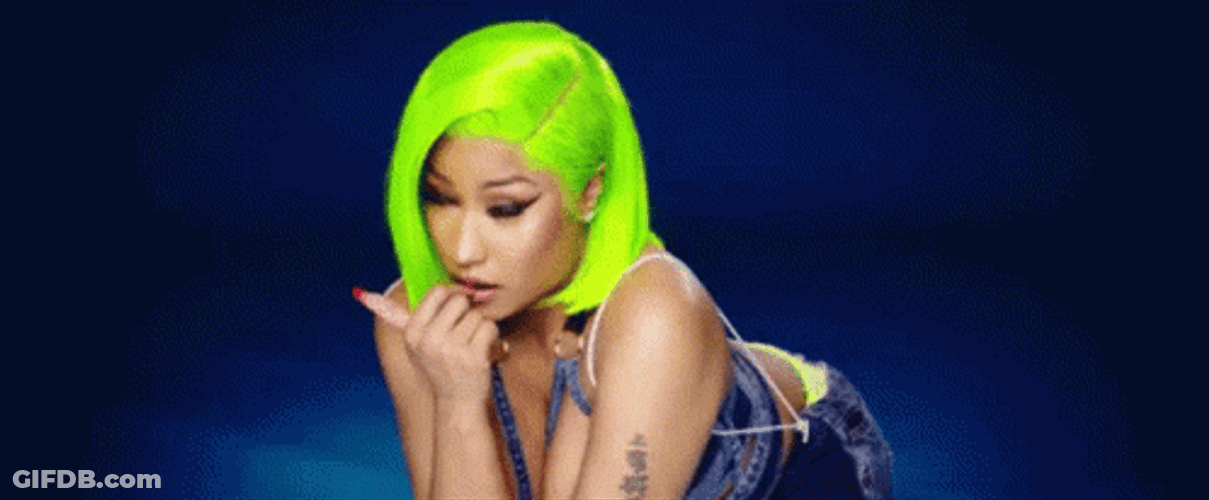 Nicki Minaj Bends Over And Winks GIF