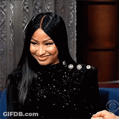 Nicki Minaj Covering Her Mouth Hollering GIF