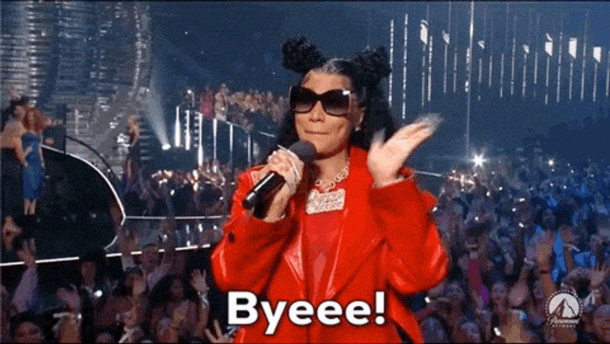 Nicki Minaj On An Awards Event Waving Byeeee GIF