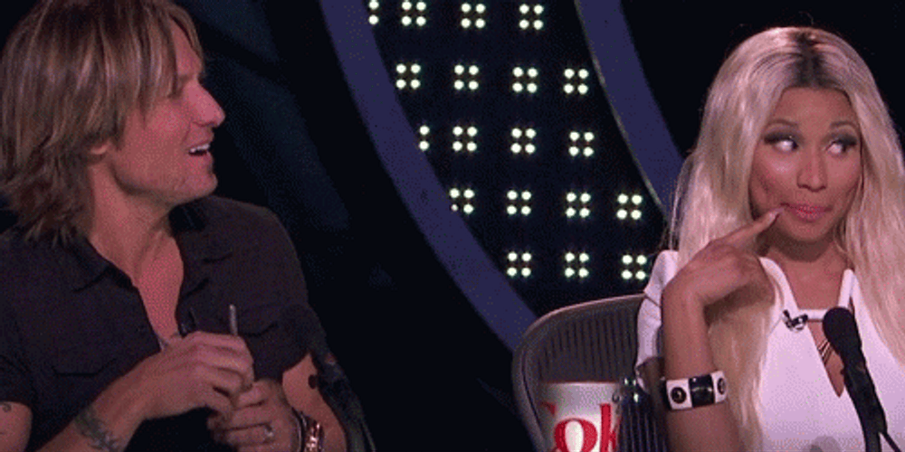 Nicki Minaj Playing Innocent GIF