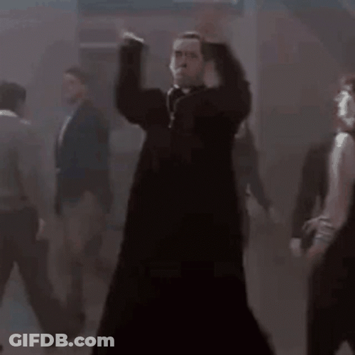 Nicolas Cage Face Off Scene Dancing Like Crazy GIF