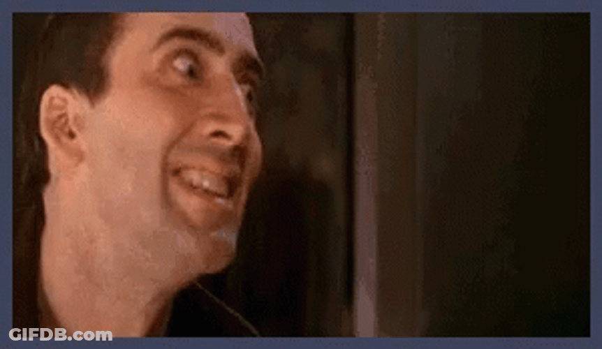 Nicolas Cage Face Off Scene Scary Smile GIF