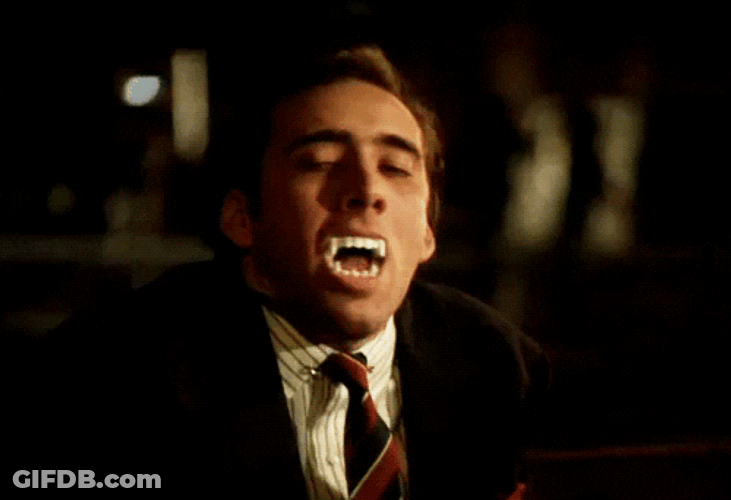 Nicolas Cage Fake Vampire Teeth GIF