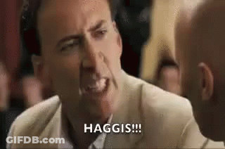 Nicolas Cage Making Funny Face Talking To Man In Crowd GIF