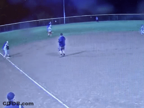 Night Baseball Game Man In Blue Shirt GIF