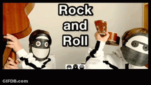 Ninjas Playing Drums In Front Of Rock And Roll Sign GIF