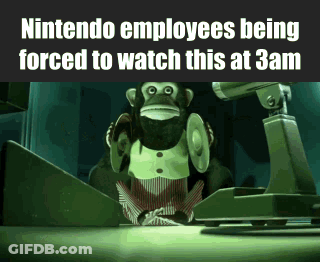Nintendo Employees Being Forced To Watch This At 3Am With A Monkey On A Desk GIF