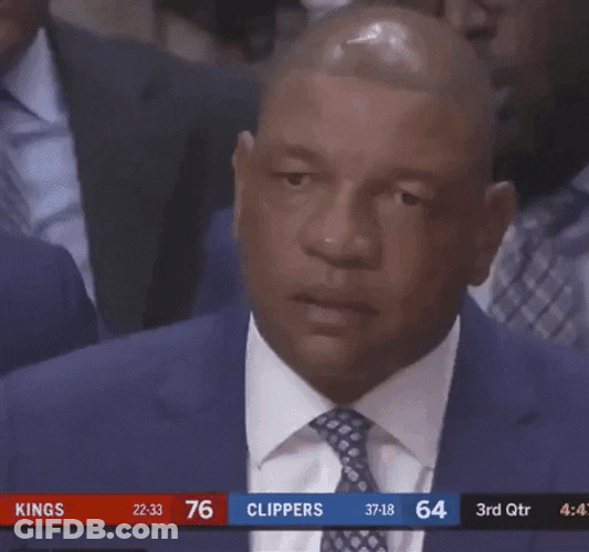 Not Impressed Doc Rivers Staring GIF