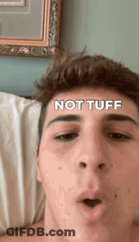 Not Tuff Young Man Lying In Bed GIF