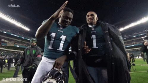 Number 11 Jersey Player Next To Number 1 Jersey Man GIF