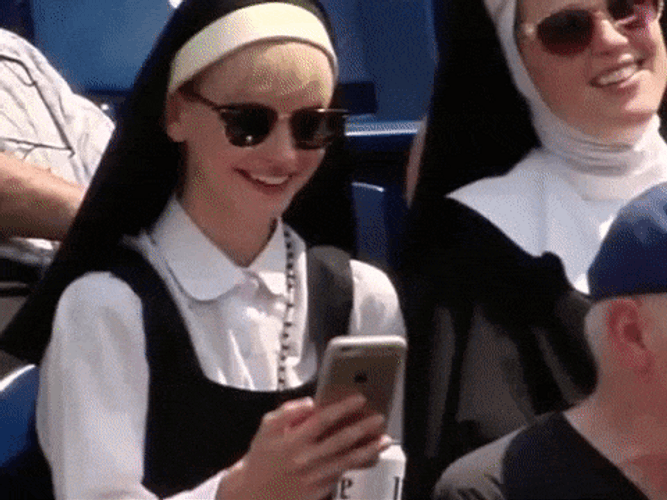 Nun Selfie With Beer GIF