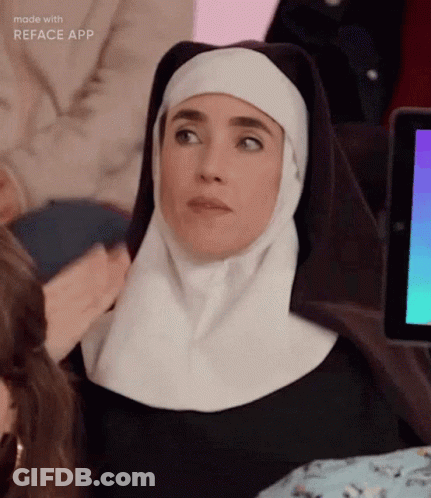 Nun Sitting At Computer GIF