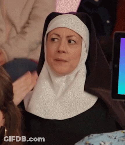 Nun Sitting At Computer GIF