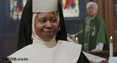 Nun Smiling In Front Of Priest GIF