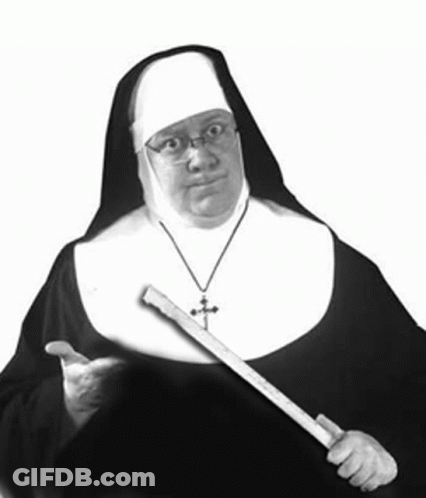 Nun With Glasses Holding Wooden Stick GIF