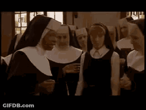 Nuns Standing In Church GIF
