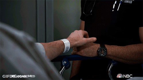 Nurse Holding Patient Hand NBC Chicagomed Ad GIF