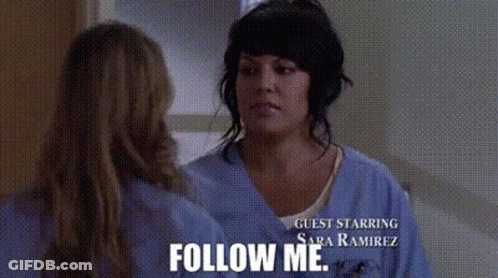 Nurse Talking To Another Nurse Follow Me GIF