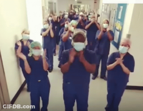 Nurses Clapping In Hallway GIF