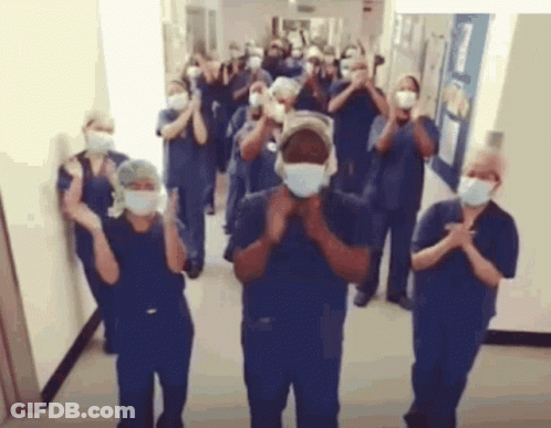Nurses Clapping In Hospital Hallway GIF