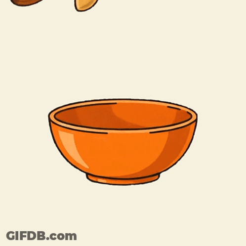 Nuts And Chocolate Falling Into Cereal Bowl GIF