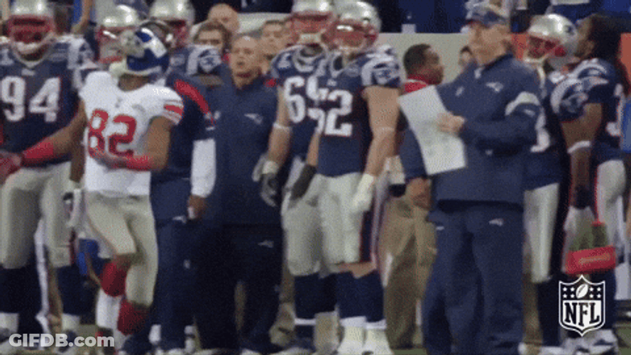 Ny Giants Player Falling Alongside Opponents GIF