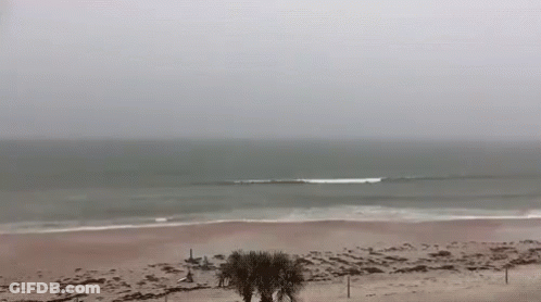 Ocean View From Beach On Cloudy Day GIF