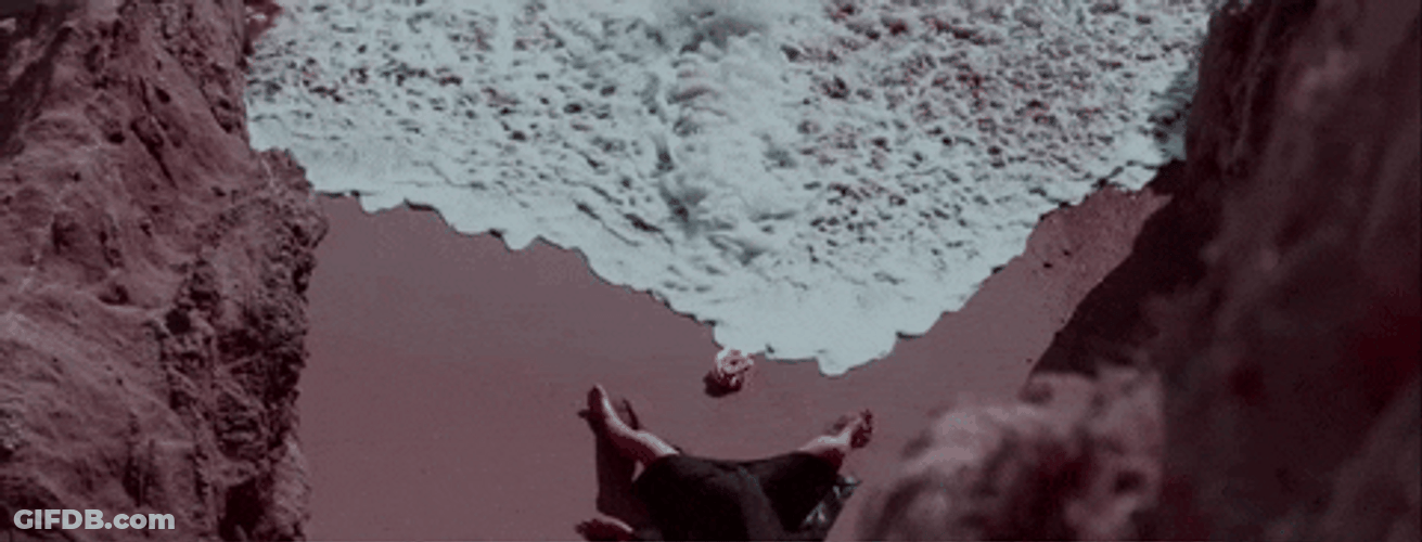 Ocean Waves While Sleeping On The Sand GIF