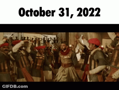 October 31 2022 Is Displayed On A Screen With A Group Of People Dancing GIF